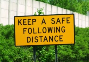Sign that says "Keep a safe following distance"